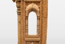 A Wooden Indian Colonnade With Five Arches and Candle Alcoves