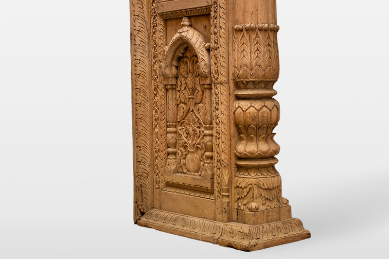 A Wooden Indian Colonnade With Five Arches and Candle Alcoves