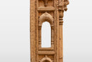 A Wooden Indian Colonnade With Five Arches and Candle Alcoves