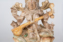 Goddess Saraswati Playing Veena on a Lotus Base