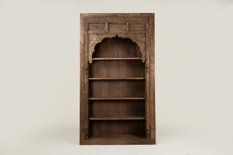 An Indian Carved Arch Modified into Bookshelf