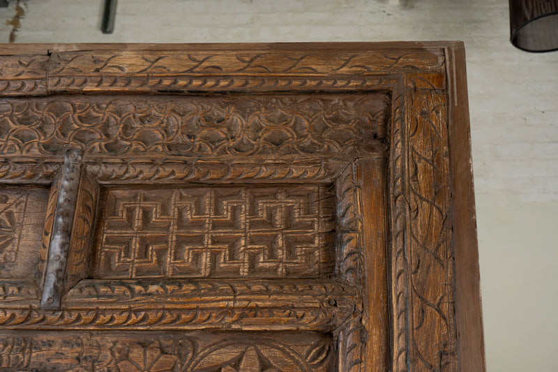 An Indian Carved Arch Modified into Bookshelf