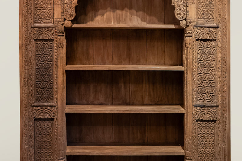 An Indian Carved Arch Modified into Bookshelf
