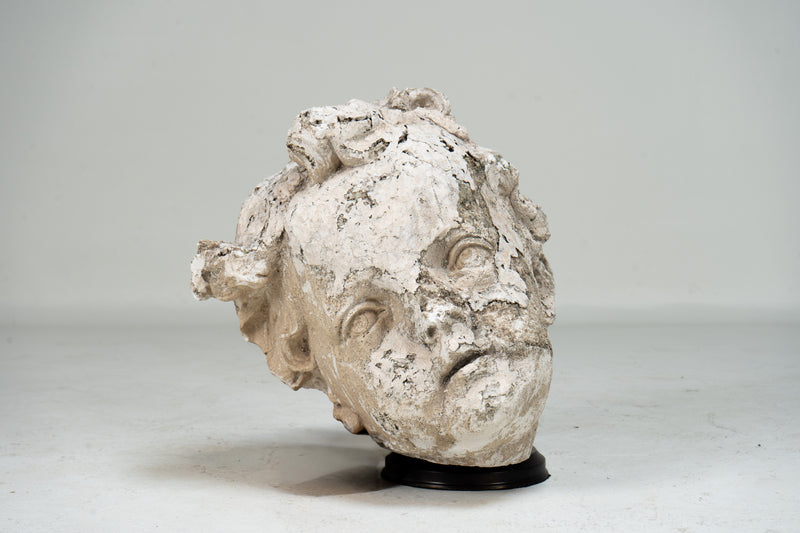 A Plaster Sculpture of an Infant face