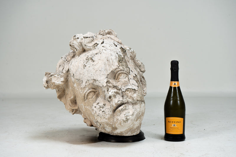 A Plaster Sculpture of an Infant face