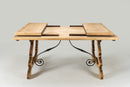 A Spanish Oak Dining Table with Two Leaf Extensions