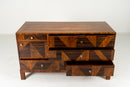 A Chest of Drawers With Triangular Parquetry