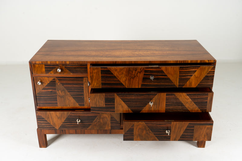 A Chest of Drawers With Triangular Parquetry