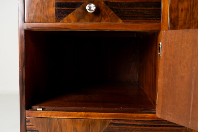 A Chest of Drawers With Triangular Parquetry