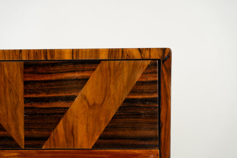 A Chest of Drawers With Triangular Parquetry