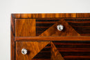 A Chest of Drawers With Triangular Parquetry