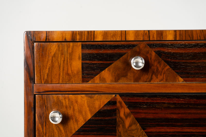 A Chest of Drawers With Triangular Parquetry