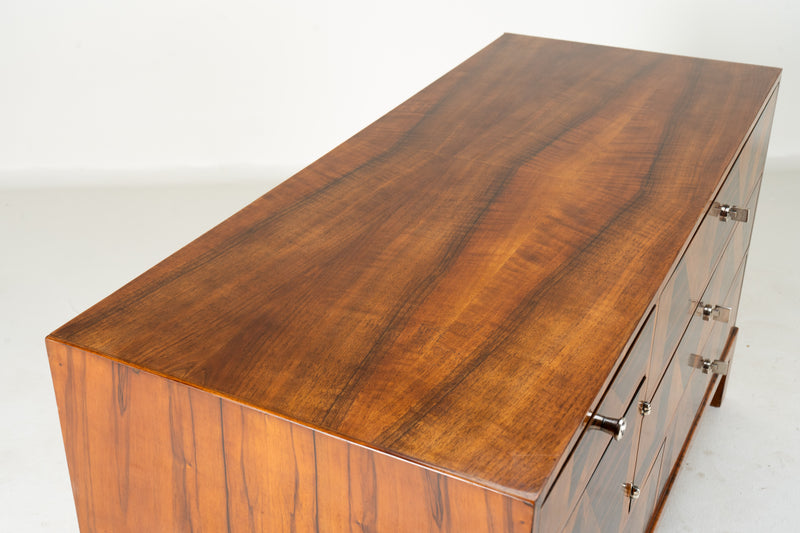 A Chest of Drawers With Triangular Parquetry