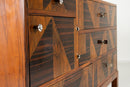 A Chest of Drawers With Triangular Parquetry