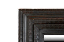 A Northern Italian Ebonized Mirror Frame in the Flemish Style