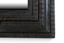 A Northern Italian Ebonized Mirror Frame in the Flemish Style