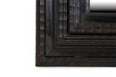 A Northern Italian Ebonized Mirror Frame in the Flemish Style