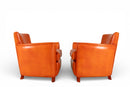 A Pair of French Leather Armchairs