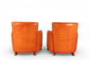 A Pair of French Leather Armchairs