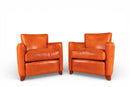 A Pair of French Leather Armchairs