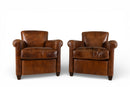 A Pair of French Leather Armchairs