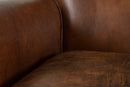 A Pair of French Leather Armchairs