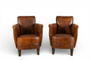 A Pair of Petite Leather Chairs