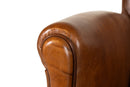 A Pair of Petite Leather Chairs
