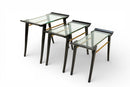 A Set of Three Nesting Tables with Glass Top