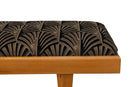 A Bench With a Cushioned Seat and Glass Table Top