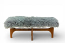 A Walnut Bench with Faux Sheepskin