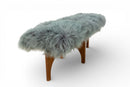 A Walnut Bench with Faux Sheepskin