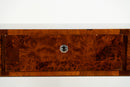 A Console Table with Walnut Veneer Drawer Fronts and Glass Top