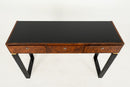 A Console Table with Walnut Veneer Drawer Fronts and Glass Top