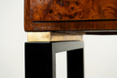 A Console Table with Walnut Veneer Drawer Fronts and Glass Top