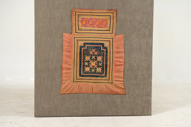 A Vintage Hmong Baby Carrying Clothes on Frame