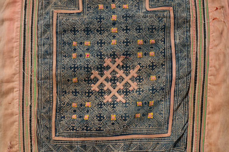 A Vintage Hmong Baby Carrying Clothes on Frame