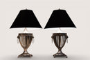 A Pair of Urns with Lion Head Handles in the Style of Barker-Ellis