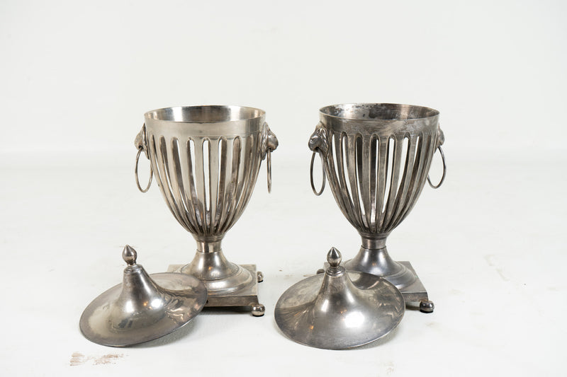 A Pair of Urns with Lion Head Handles in the Style of Barker-Ellis