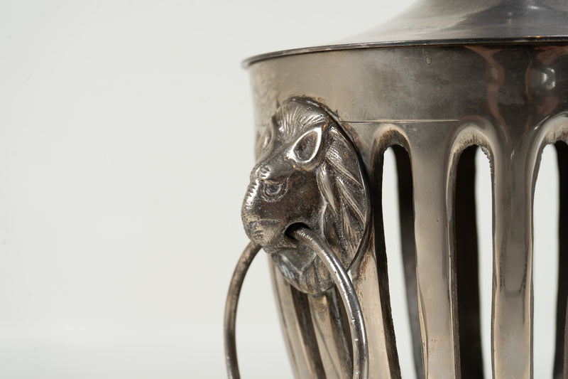 A Pair of Urns with Lion Head Handles in the Style of Barker-Ellis