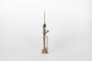 A Brass Figure of a Man