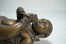 A Brass Figure of infant Krishna
