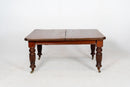 A British Colonial Dining Table with Extensions