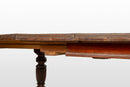 A British Colonial Dining Table with Extensions