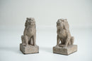 A Pair of Chinese Limestone Miniature Foo Dogs