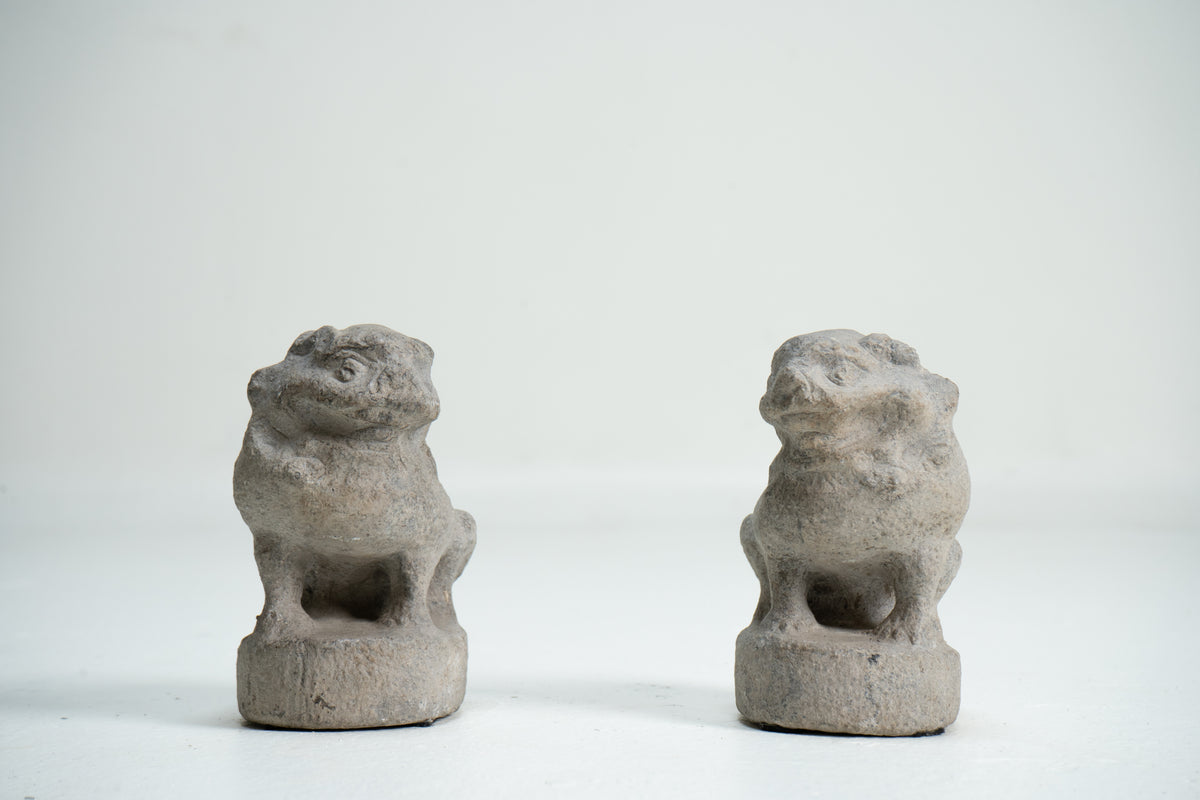 A Pair of Chinese Limestone Miniature Foo Dogs