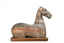 A Grey Pottery Recumbent Horse