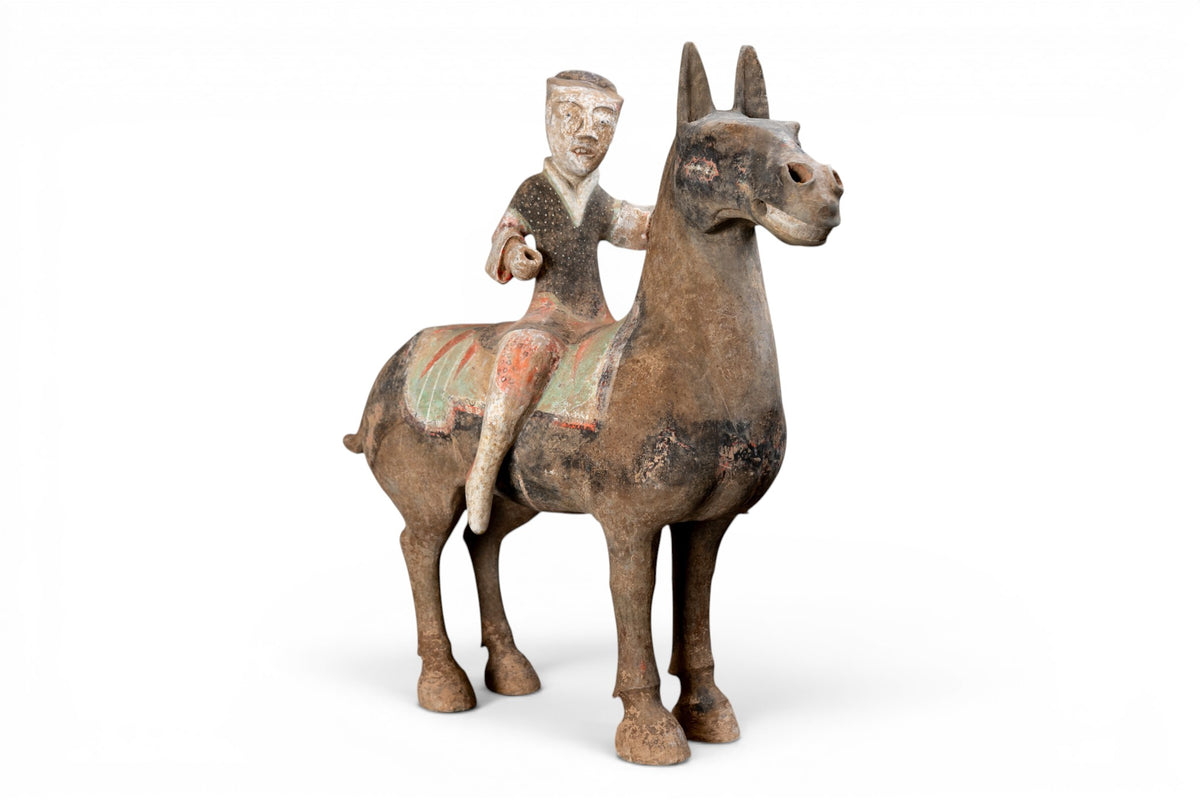 A Large Painted Pottery Equestrian Figure