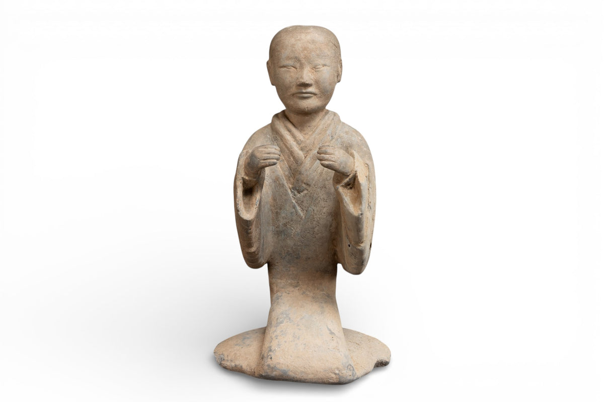 A Seated Terracotta Court Figure