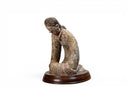 A Seated Figure of a Han Court Dancer
